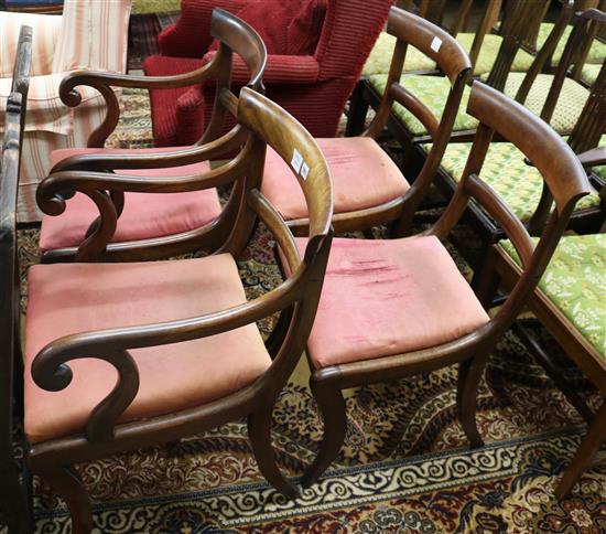 A set of four Regency mahogany dining chairs (two arm, two single)